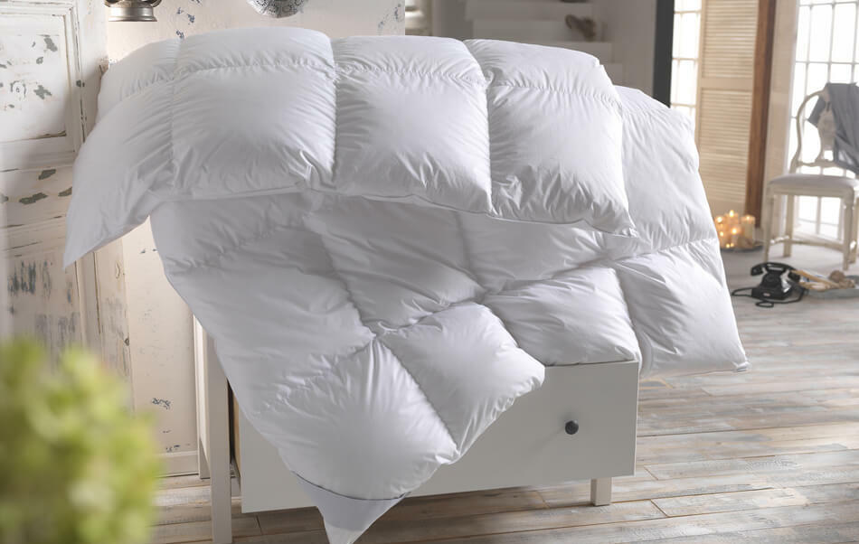 couette et oreiller blanc