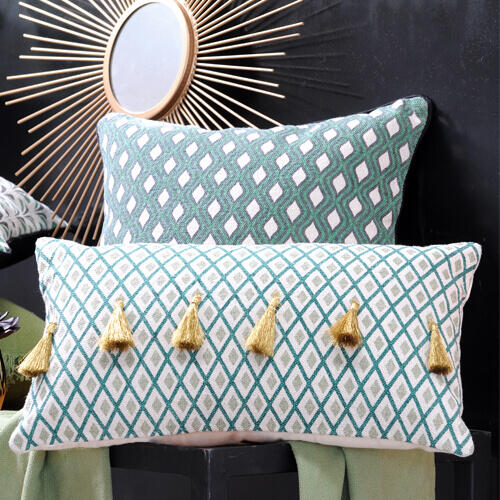 coussins vert avec pompons